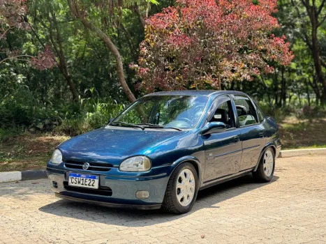 Ação corsa sedan gls 1.6 (loteria federal)