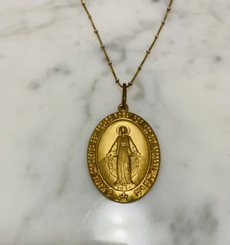 Centro Espirita Cavaleiros da Luz - 01 corrente em ouro 18k n.sª das graças + relógio