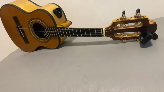 Ação 548 = cavaco/banjo/celular,o ganhador escolhe