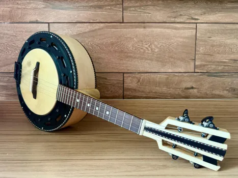 Ação 592=cavaco ou banjo, o ganhador escolhe