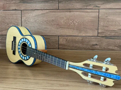 Ação 586 = cavaco ou banjo, o ganhador escolhe