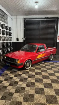 Faccin Garage - Chevy 500 sl 1985 vermelho bonzanza placa preta