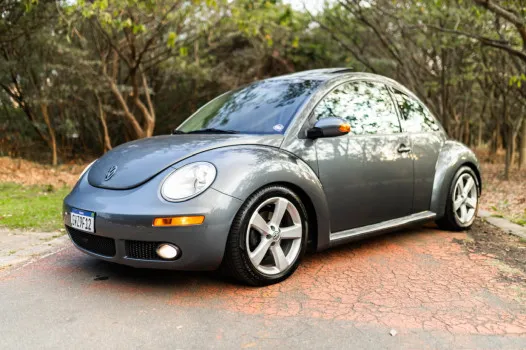 Ação new beetle completo manual