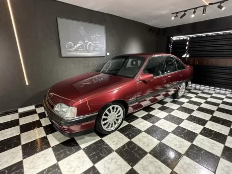 21ª ação omega gls 2.2 mpfi 1995 vermelho goya